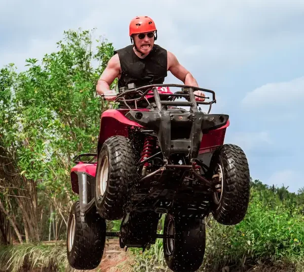 Traveler riding ATV in Bali adventure tours