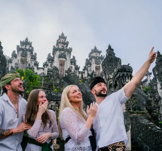 Traveler enjoying Bali sightseeing tour at temple