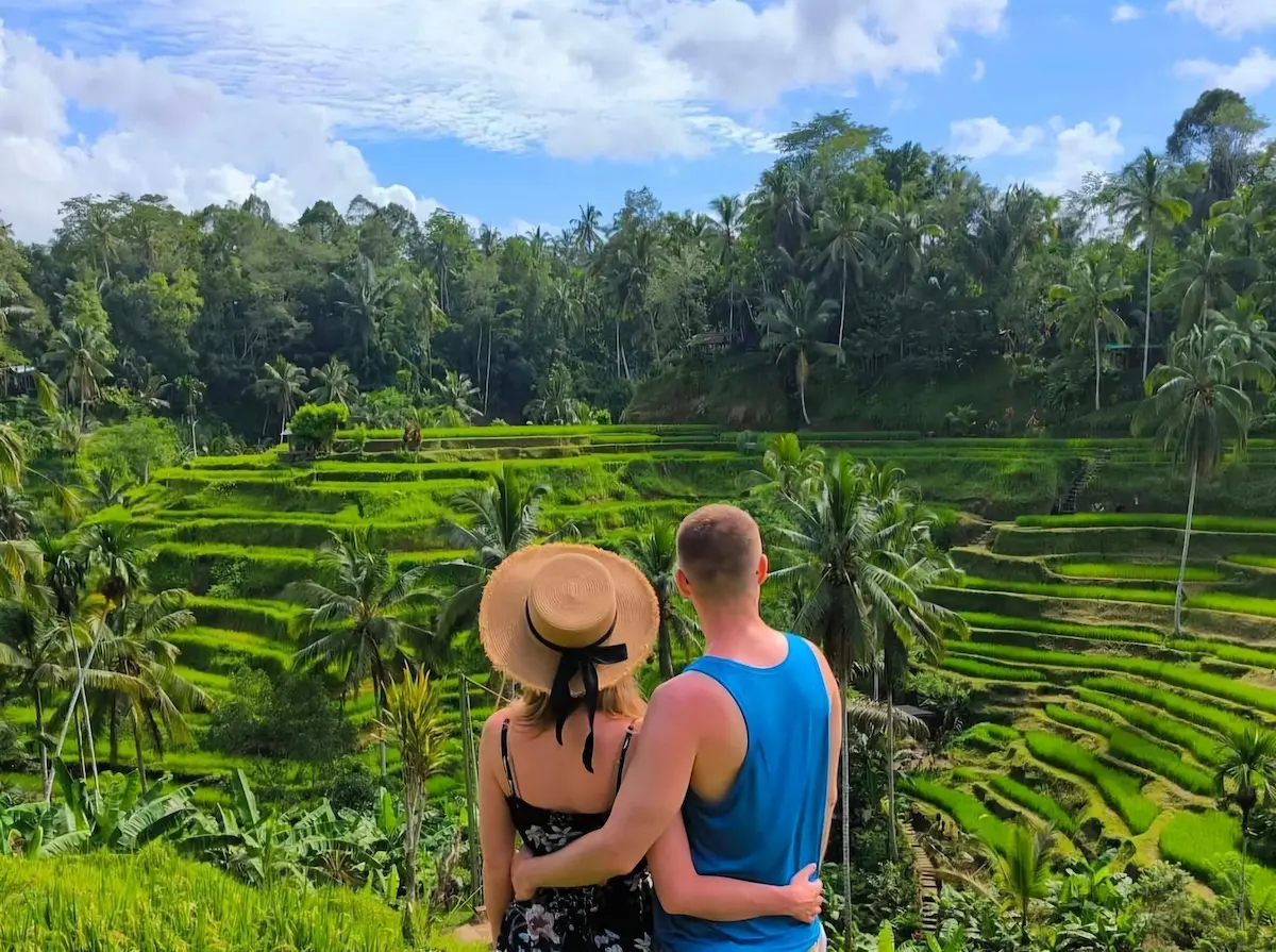 Traveler enjoying the view of Tegalalang Rice Terraces during Bali Instagram Tour.