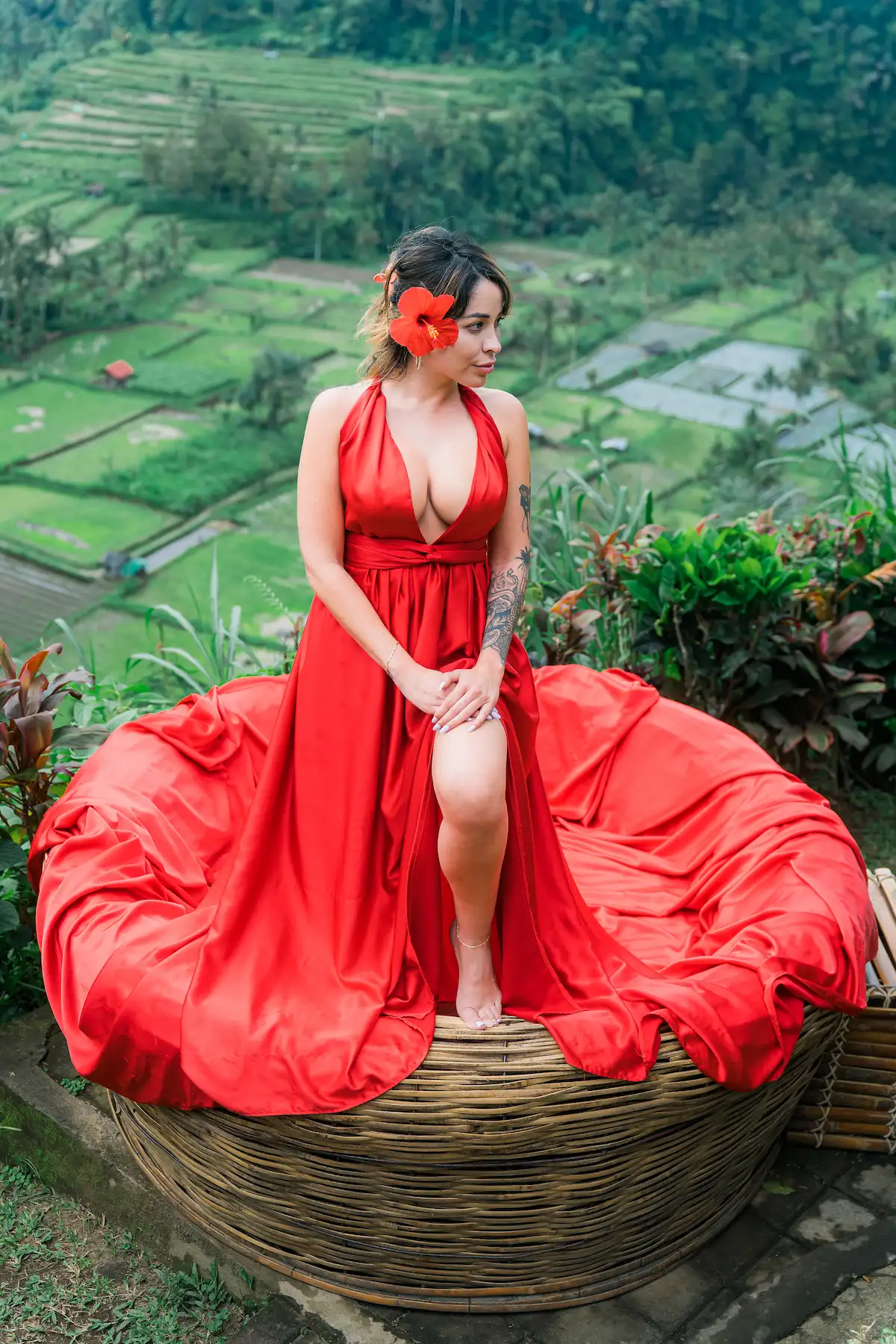 Female traveler standing in a bird nest photo spot – one of the most Instagrammable places in Bali.