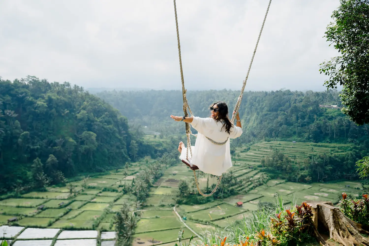 Woman enjoying the jungle swing – one of the most iconic Instagram spots in Bali tour.
