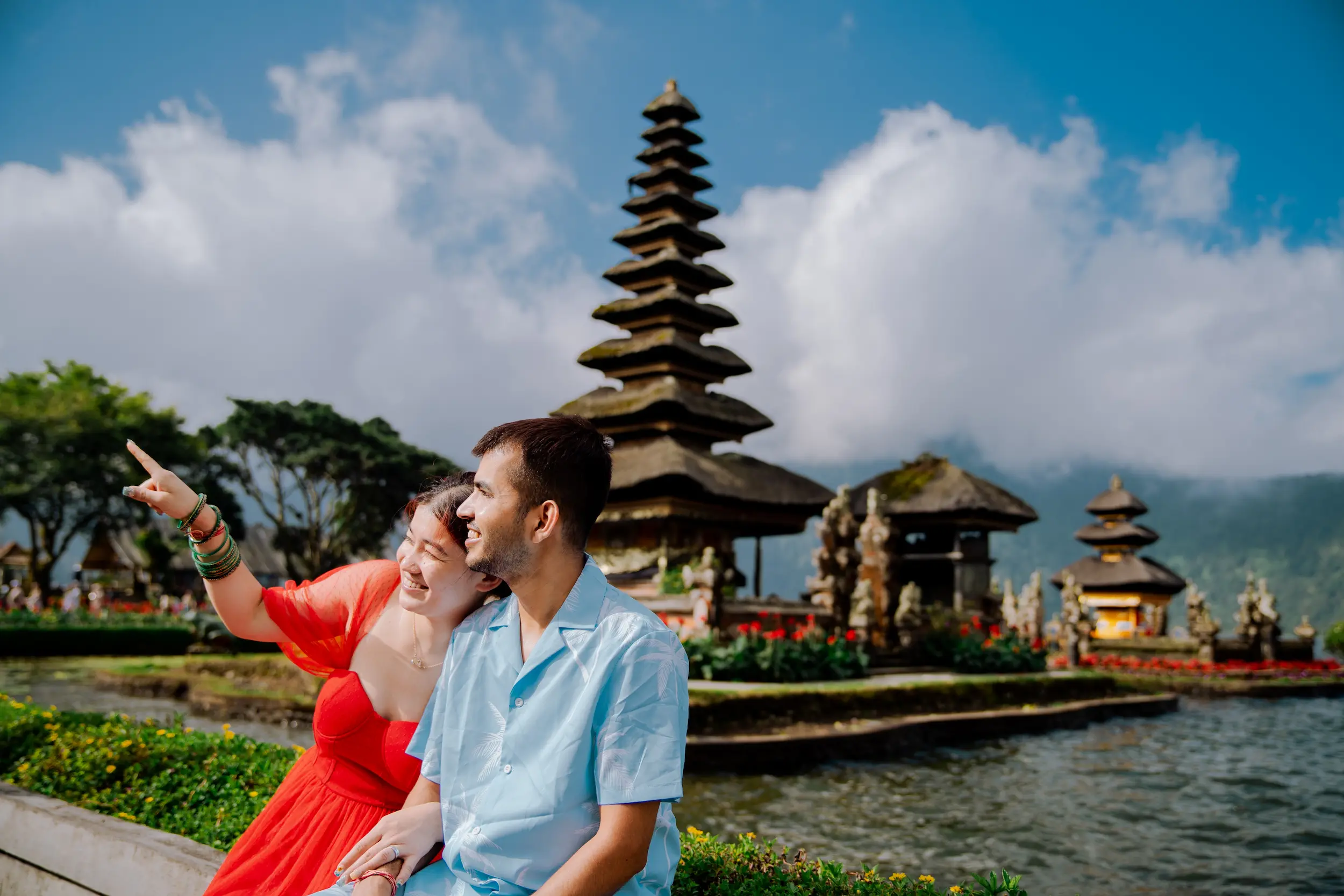 Couple enjoying Ulun Danu Beratan Temple during a day trip in Bali