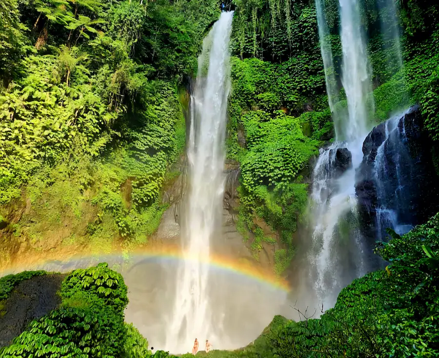 Rainbow at Sekumpul Waterfall, a must-see destination on Bali day trips