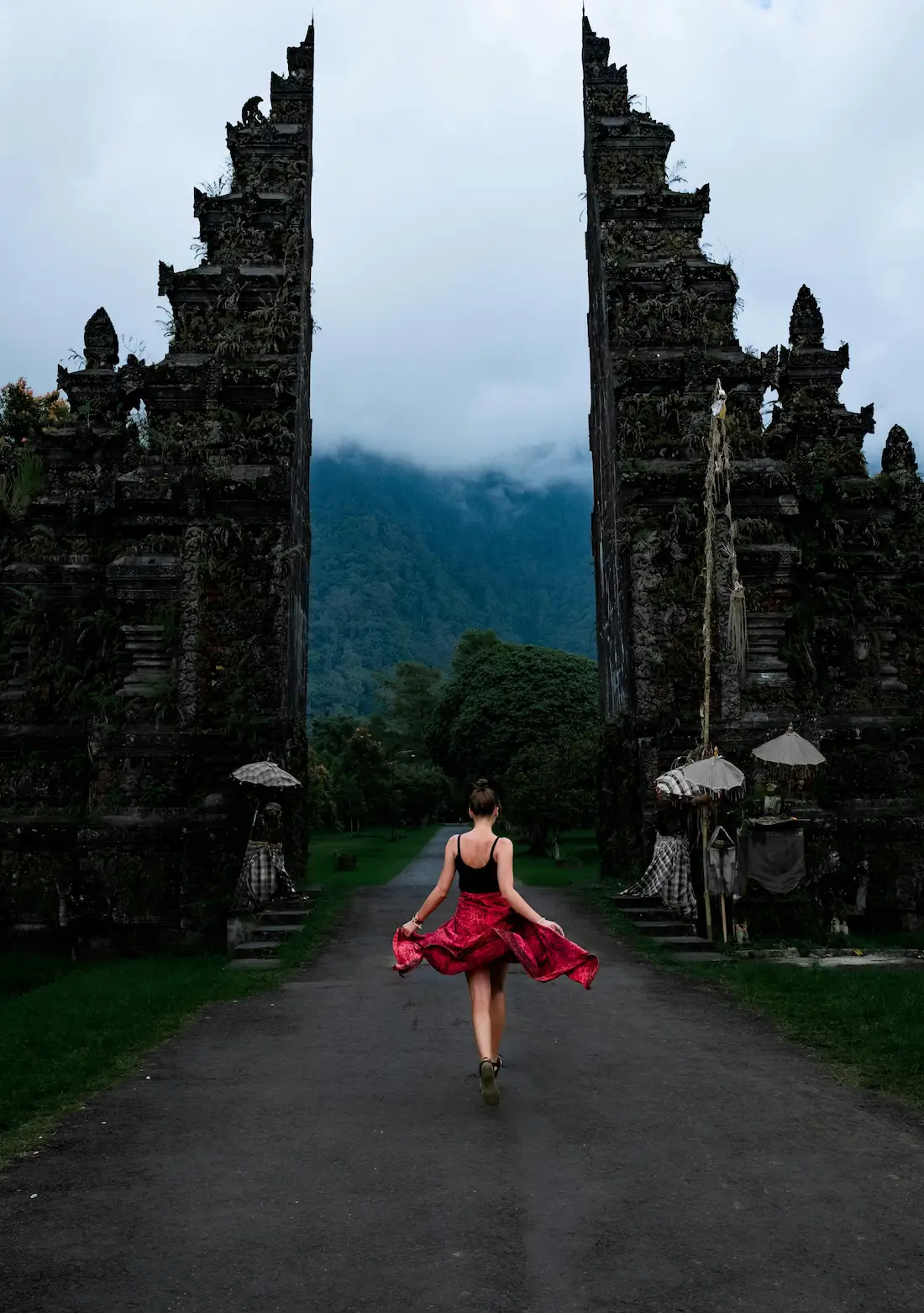Woman posing at Handara Gate, North Bali Instagram spot