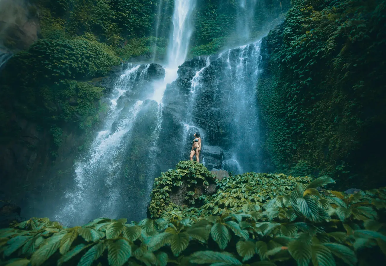 Traveler enjoying Sekumpul, a must see waterfall in Bali