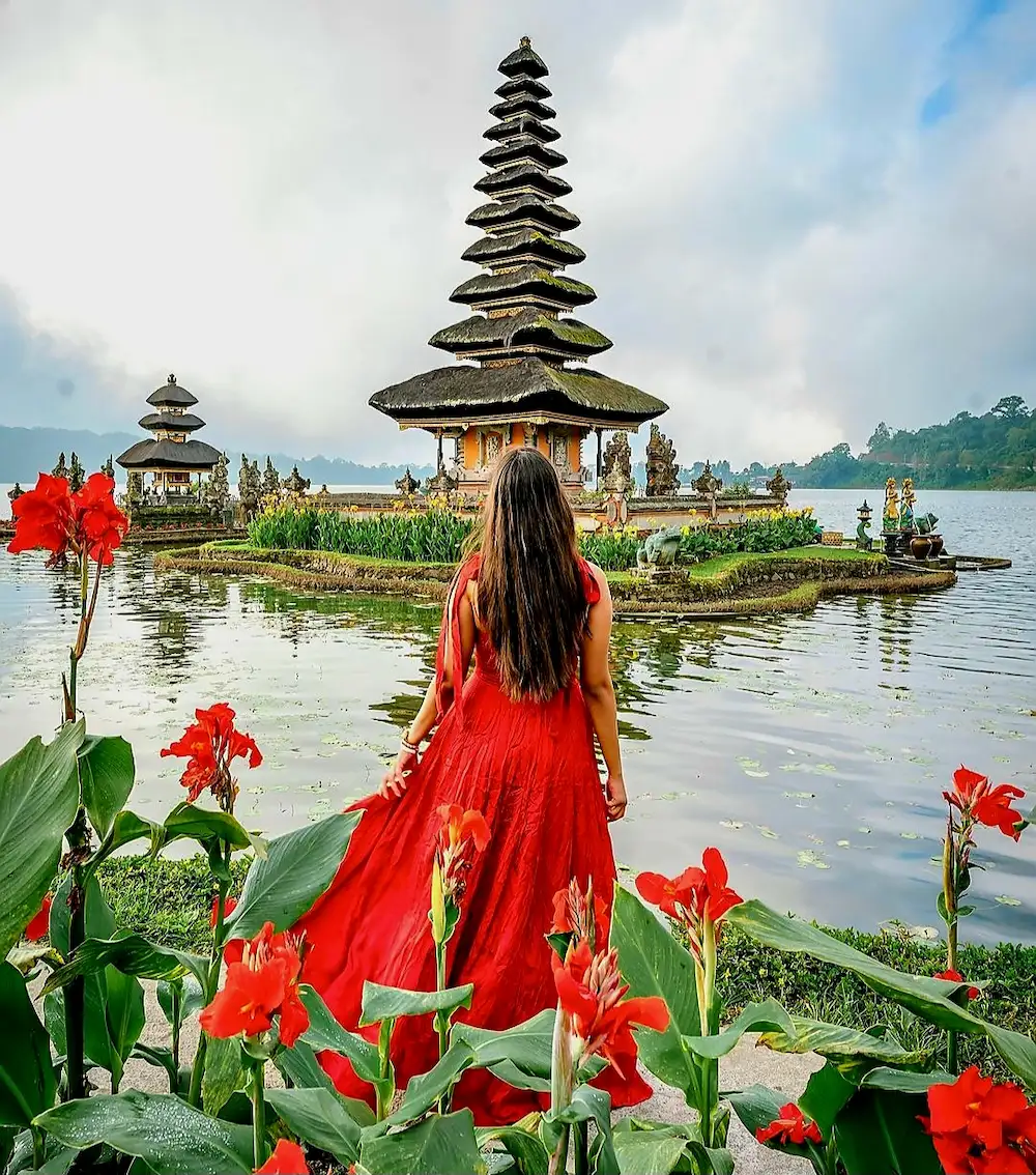 Woman visiting Ulun Danu Temple on North Bali private tour