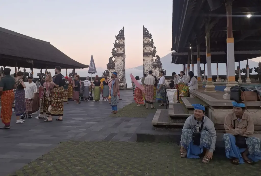 Crowds of tourists visiting the Gates of Heaven at Lempuyang Temple with Mount Agung in the background