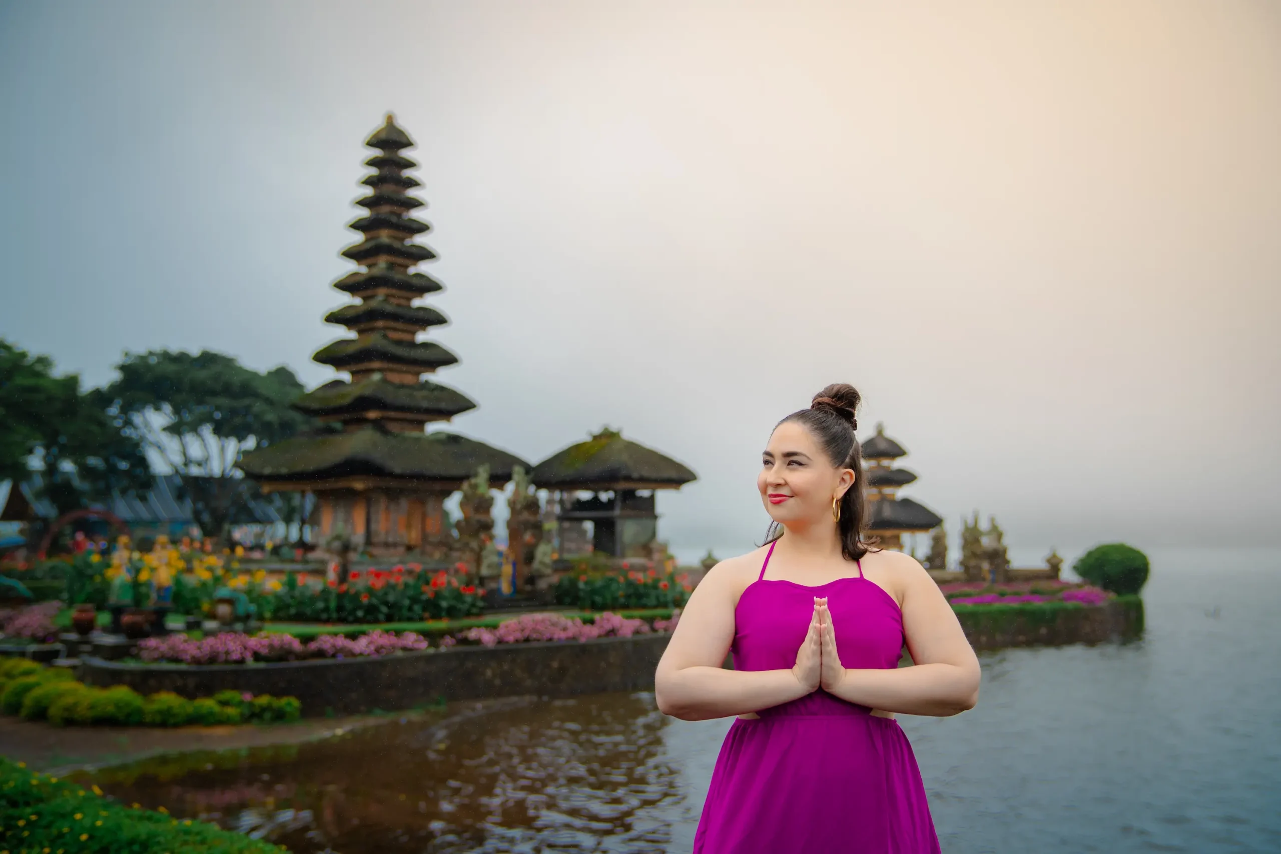 Visitor pose at Ulun Danu Temple